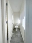 The primary ensuite water closet showing a toilet.