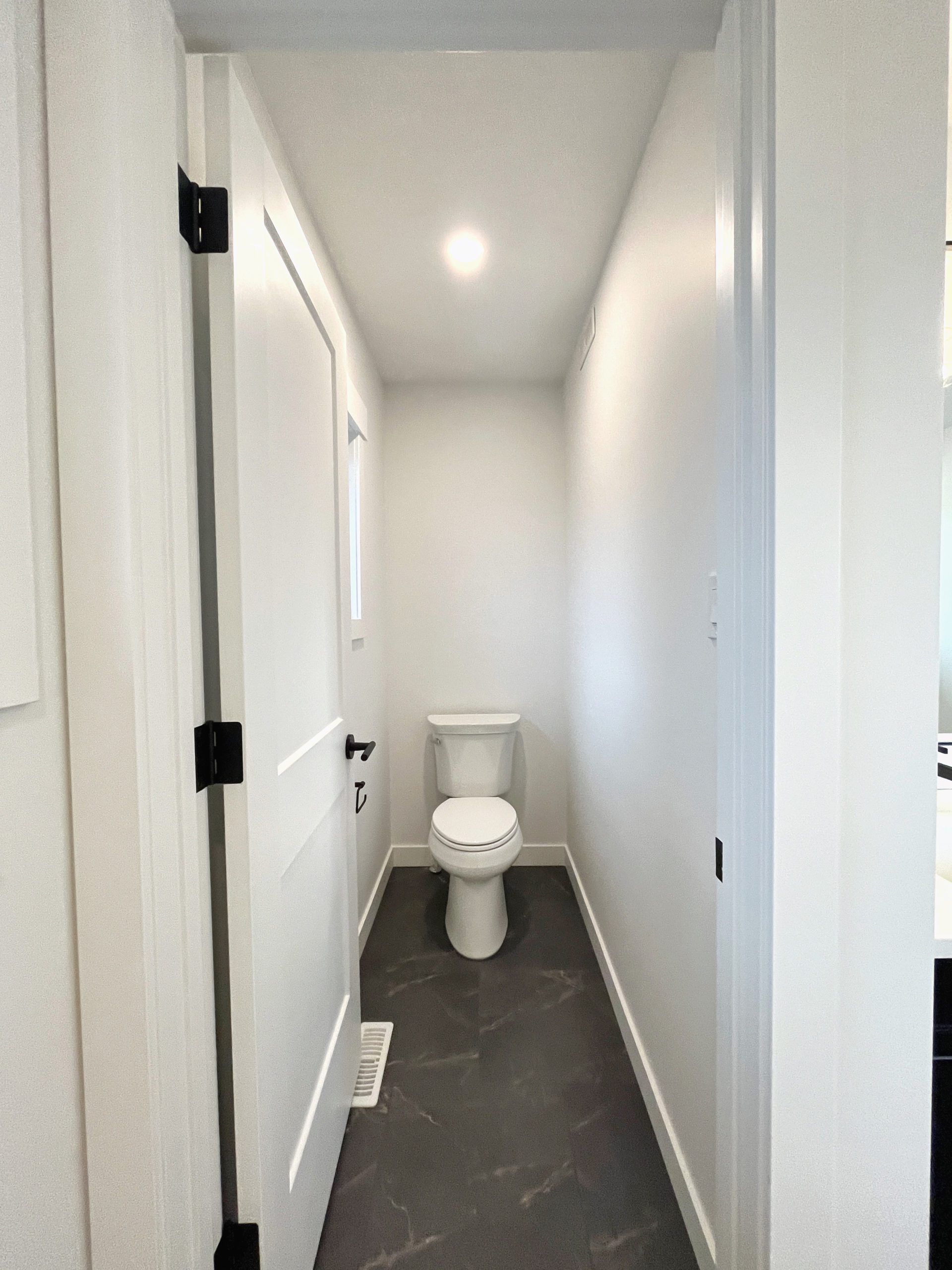 A water closet showing a toilet.