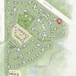 The site plan for the Creeks neighbourhood development with a red pin showing the homes location in the neighbourhood.